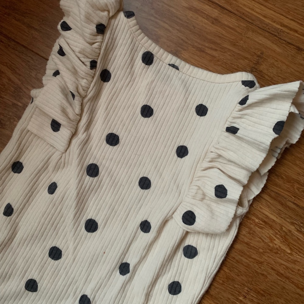 Cat & Jack ruffled sleeveless bodysuit. Cream and black polka dot.
